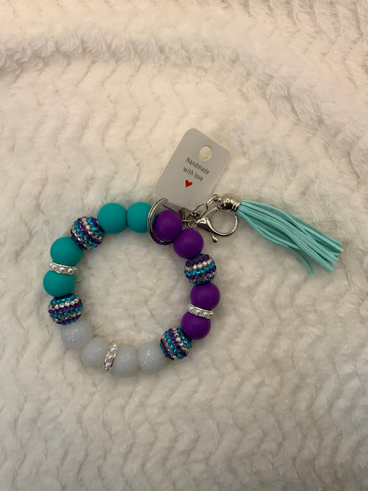 RTS {Turquoise/Purple Bling Wristlet}